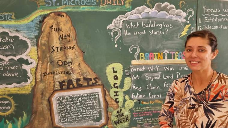 Salina D. at chalkboard