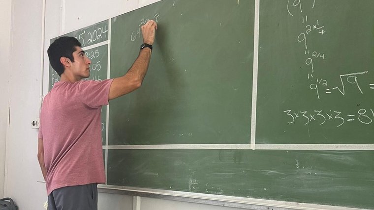 In addition to classroom teaching, Sam tutors Namibian secondary students after school.