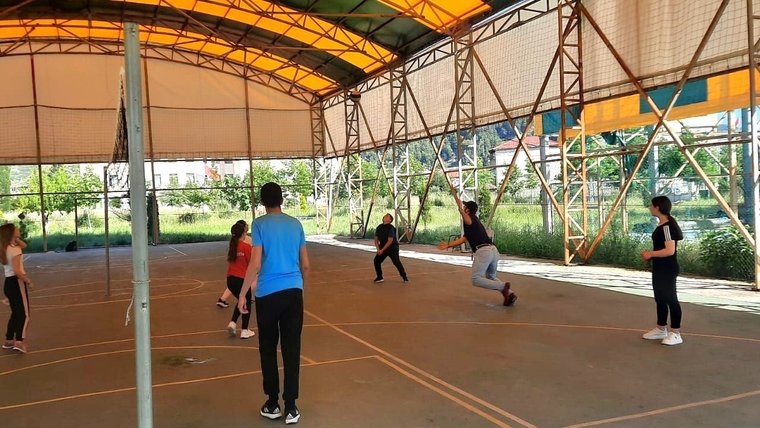 Sebastian plays volleyball with students in his VII-B class in Albania.