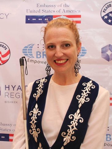 Serena Olson poses for a photo alone.