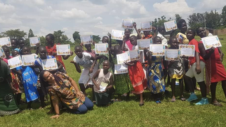 Students show off certificates