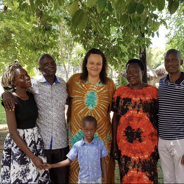 Volunteer with her host family.