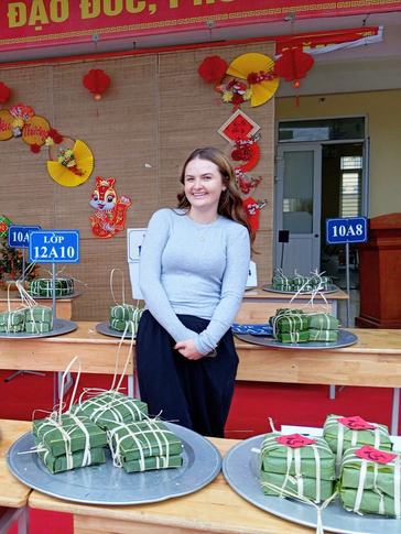 Sophia enjoys a Tết market organized by students in her community.