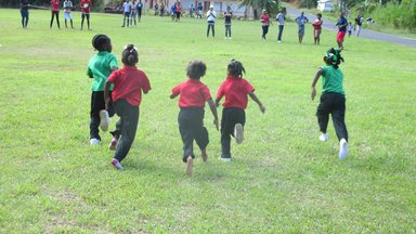 Children play during a school Sports Day in Dominica.