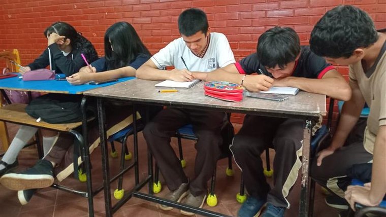 StudentsUsingChairsSocks