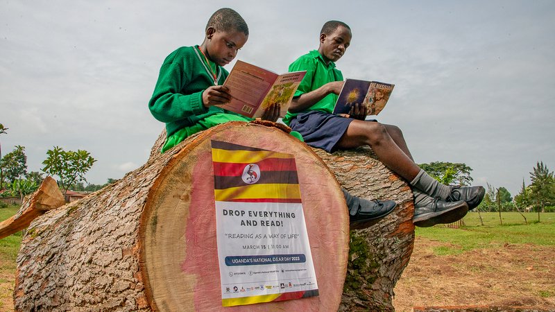 Students reading on DEAR Day 2023 Uganda