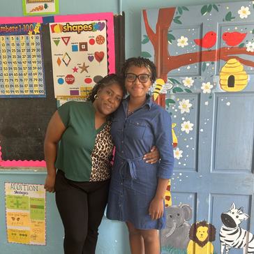 Tajah with her counterpart in Dominica.