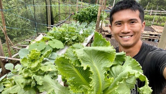 Peace Corps Volunteer Tatsumi Y. at farm