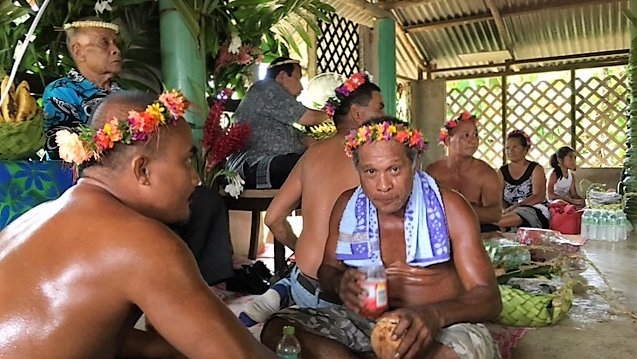 The Nahnmwarki (sitting in chair) and others with lesser titles.