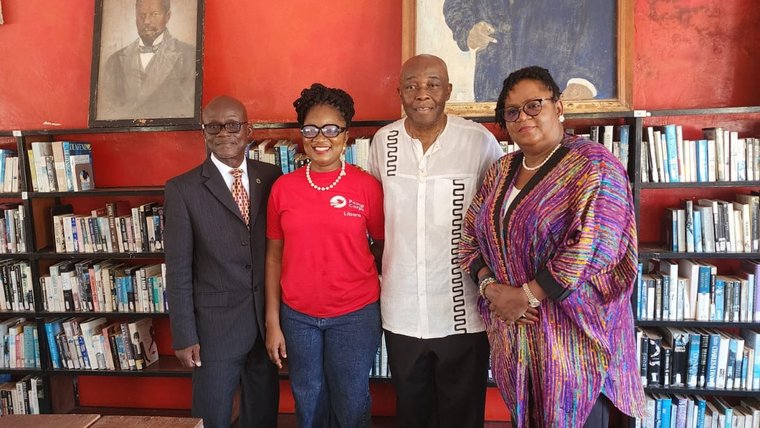 Kwame (third from left) with the vice principal and invited guest during the first career day at his school.