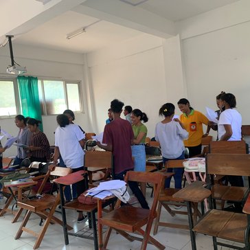 Students standing up doing group work
