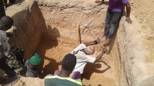 Laura Latrine - Villagers digging latrine pit.jpg