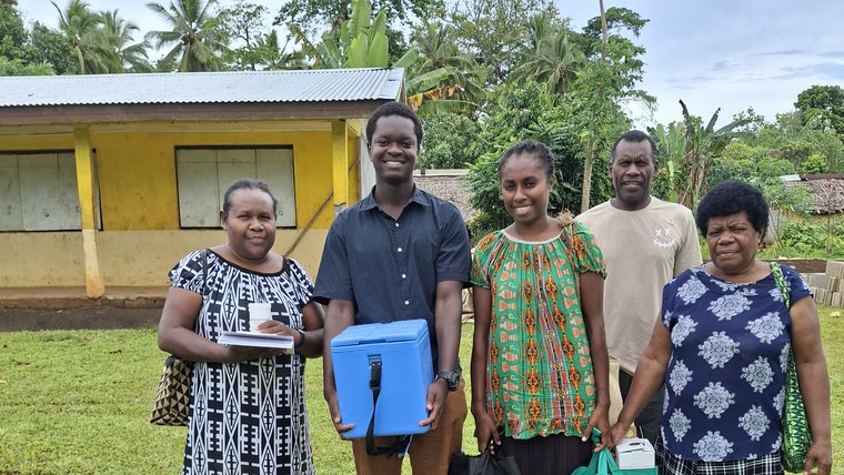 Clinic staff conduct outreach about the importance of childhood vaccination in Vanuatu.