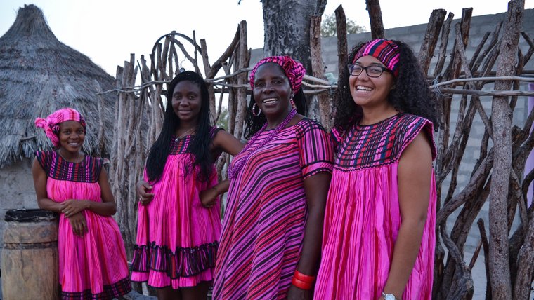 Clarice with her Namibian mother and sisters at their house.