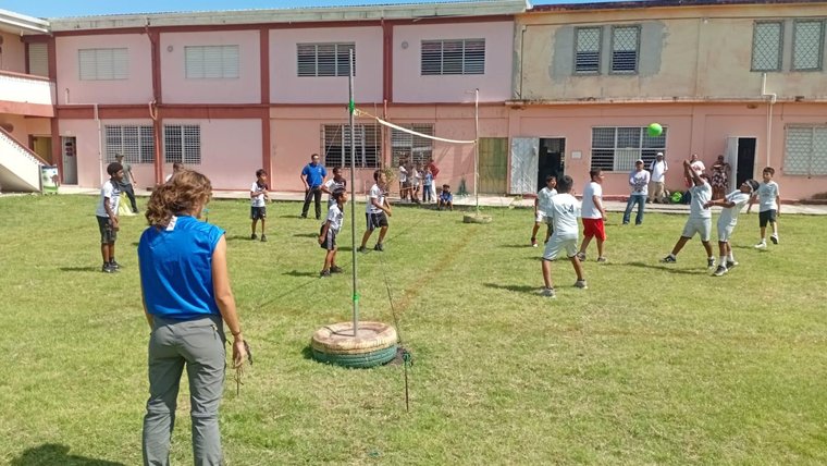 Claire supports sports camps and tournaments for youth in Belize.