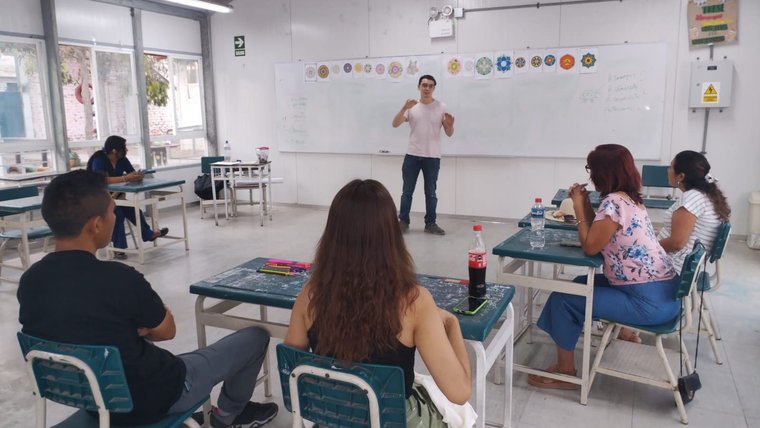 Kevin works with parents during the summer in Peru.