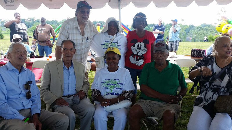 A family poses for a photo at a reunion celebrating Juneteenth.