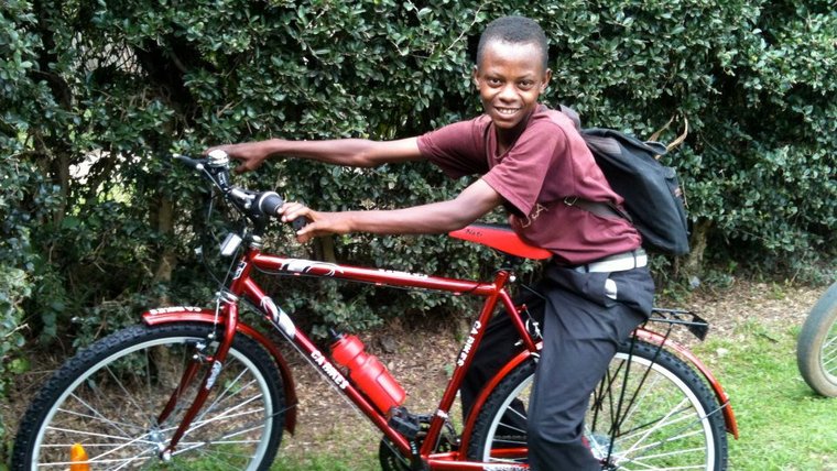 Tiffany Tai helped her organization distribute bikes to needy children.