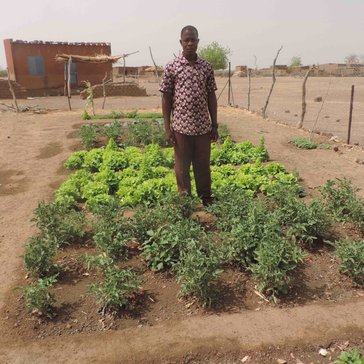 School director in the garden