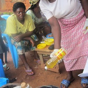 Mixing home ingredients to make organic pest repellents.