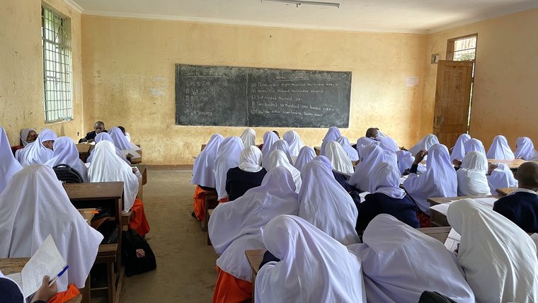 Jordan engages youth at a school in Benin.