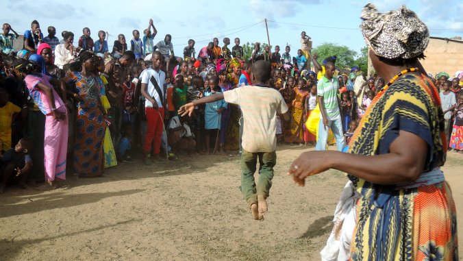 While women of all ages typically dominate the drum circles in my village, some men (and energetic boys!) have crazy moves an