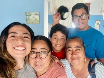 volunteer with her host family