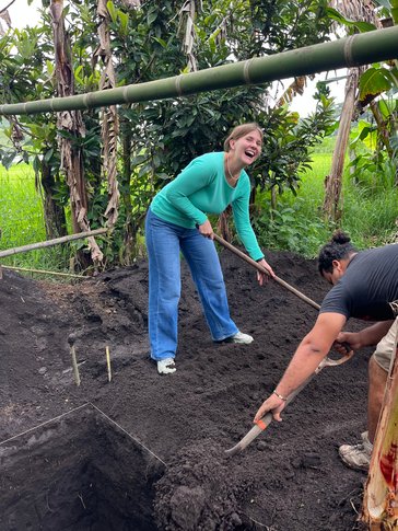 Daisy helps students with an archeological dig in Panama.