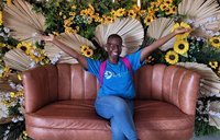 Volunteer Chanel Rigby sits on a chair