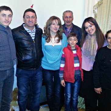 Toquyen with host family