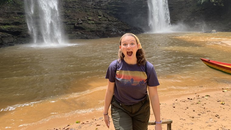 Alana smith near a waterfall.