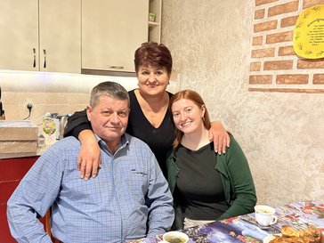 PCV Kathryn and her host family