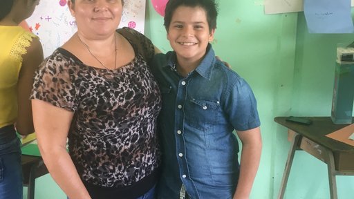 My student was so happy his mom was able to make it  all the way from their community for his graduation