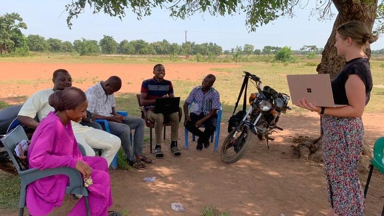 Sophia leads a professional learning community meeting for fellow teachers in Ghana.