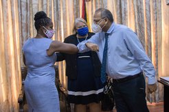 Director Rogers meets Health Minister Dr. Frank Anthony at his Brickdam office.