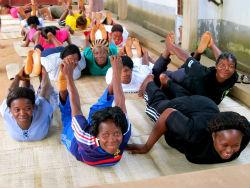 Members of the women\'s conference in Togo doing yoga.
