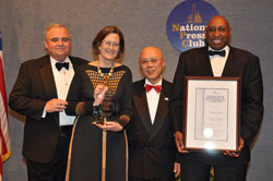 Jody Olsen, Acting Director, and Thomas Bellamy, Acting CFO, accept the 2nd CEAR Award for the Peace Corps