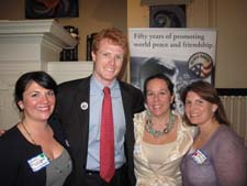 Vice President of the Boston Area Returned Peace Corps Volunteers (BARPCV ) Jacquelyn Caglia, Joe Kennedy III, Peace Corps New England Regional Manager Erin Mone-Marquez, and BARPCV President Christine Claypool at the May 6 ceremony in Cambridge, Mass.