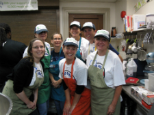 Peace Corps staff prepare dinner at a Washington, D.C., food kitchen