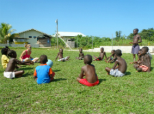 Sullivan plays games with children in her community
