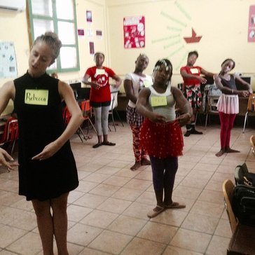 Teaching ballet in the schools.