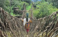 Person walks on a bridge in Guinea