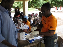 Community members are tested to see if they are carriers of the malaria parasite
