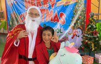 Along with playing Santa at a Christmas event, Peace Corps Volunteer Bradford inspired more holiday giving in his Thai community.