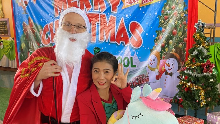 Along with playing Santa at a Christmas event, Peace Corps Volunteer Bradford inspired more holiday giving in his Thai community.