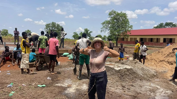 Peace Corps Ghana Volunteer Victoria and Community Building a Teacher Housing Facility Next to a Rural School for Better Access