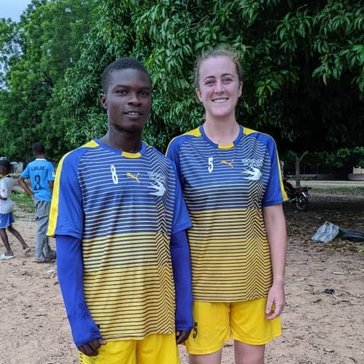 Jane enjoys playing soccer during her free time in Togo.