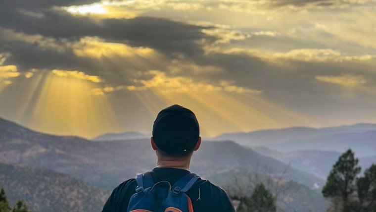 Andrew L. enjoys a beautiful sunset in Morocco.