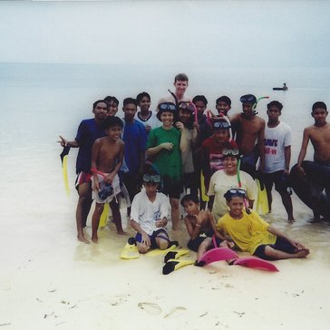 David Schopler served with the Peace Corps in the Philippines before he became an officer in the SEAL Teams, where he current