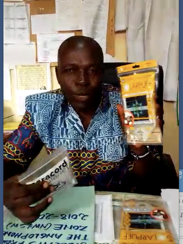 Principal of school in Cameroon with solar lamps